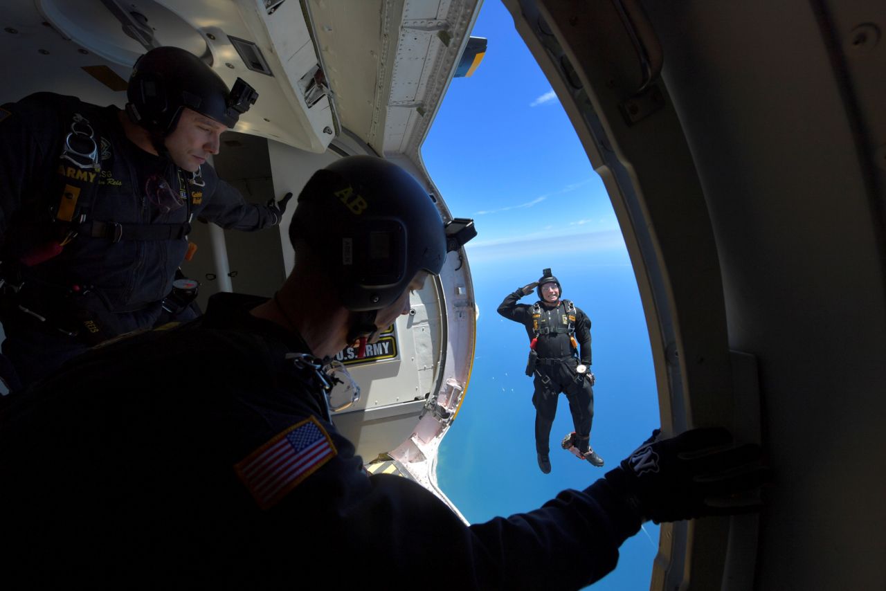 Members of the Army's Golden Knights parachute team perform during the Bethpage Air Show as part of a Memorial Day weekend event on Long Island, New York, on May 25.