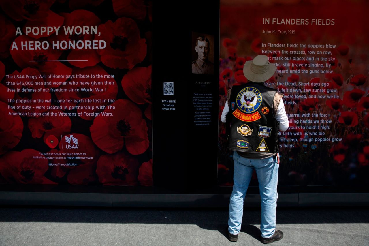 A Vietnam veteran visits the USAA Poppy Wall of Honor on the National Mall in Washington on May 24. The wall houses 645,000 poppies to commemorate lives lost in service.