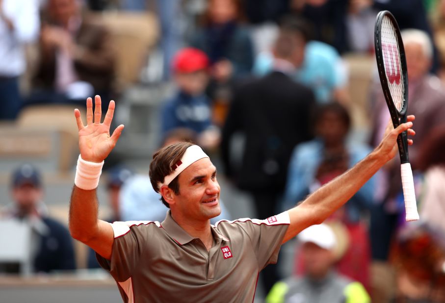 Roger Federer acknowledges the crowd after returning, and winning, at the French Open. 