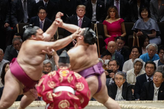 President Donald Trump attends the Tokyo Grand Sumo Tournament with Japanese Prime Minister Shinzo Abe at Ryogoku Kokugikan Stadium, Sunday, May 26 in Tokyo. 