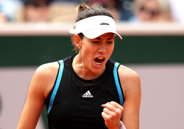 Garbine Muguruza, a former French Open champion whose ranking has dropped to 19th, rallied from a set down to beat American Taylor Townsend. 