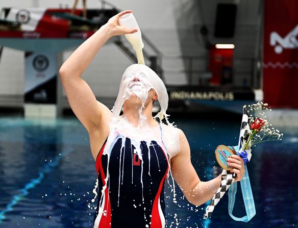 Amy Magana pours milk on herself after winning the women's diving competition at the USA Diving Senior National Championships at the Indiana University Natatorium on Saturday, May 25 in Indianapolis.