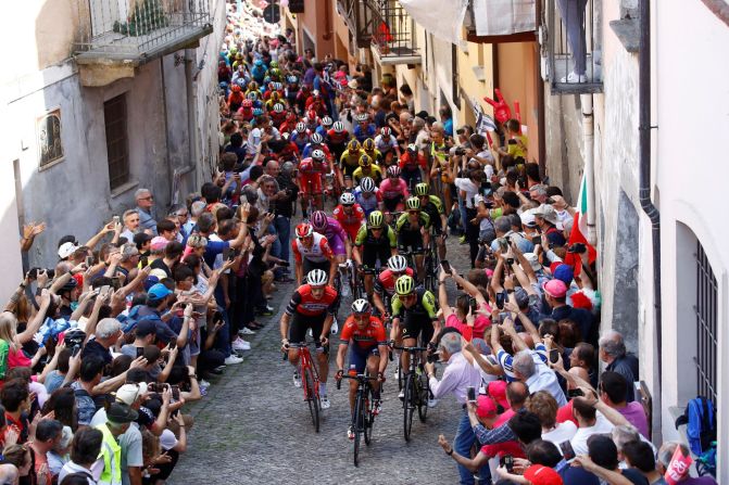 The peloton climbs the wall of San Mauricio in the town of Pinerolo during stage twelve of the 102nd Giro d'Italia (Tour of Italy) on Thursday, May 23. 