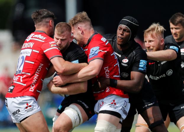 Saracens' George Kris in action with Gloucester's Mark Atkinson in the Premiership Rugby semi-finals in London on Saturday, May 25. 