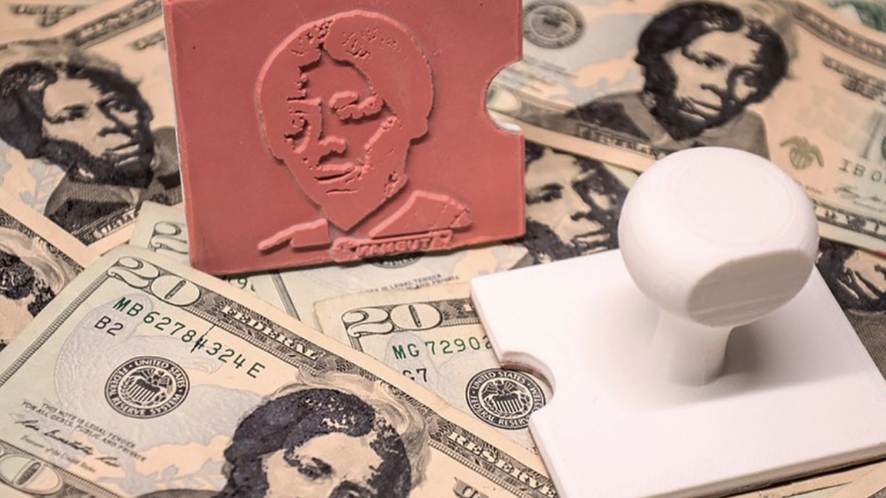 This 3-D rubber stamp allows users to superimpose Tubman's image over President Andrew Jackson's portrait.