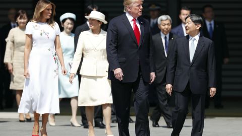 President Donald Trump and first lady Melania Trump are escorted by Emperor Naruhito and empress Masako during a welcome ceremony at the Imperial Palace in Tokyo on Monday.