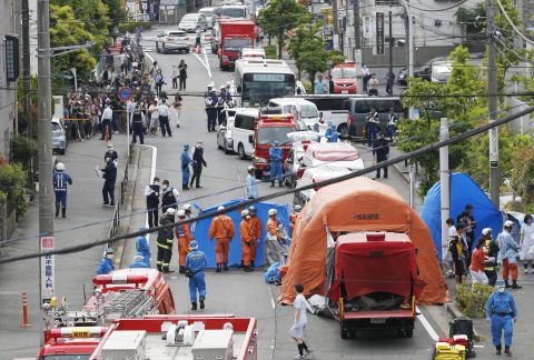 Rescuers work at the scene of an attack in Kawasaki, near Tokyo on Tuesday, May 28.