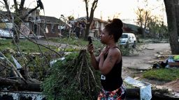 Residents inspect the damage to their homes following powerful tornadoes in Trotwood, Ohio on May 28. 
