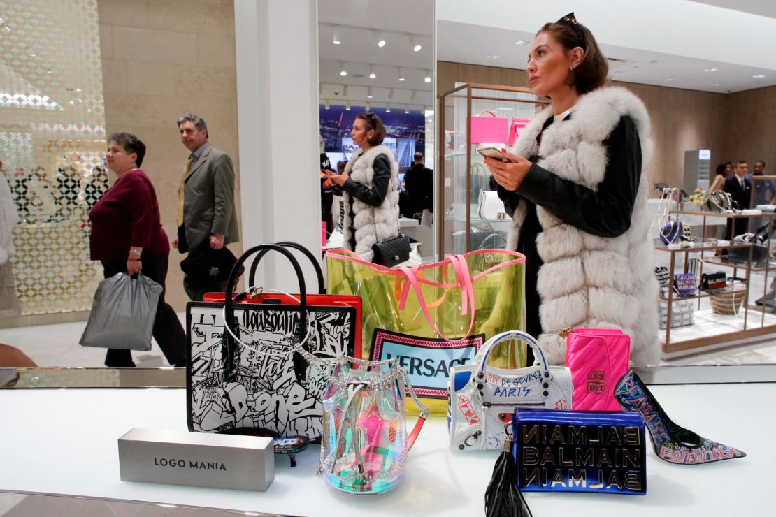 Neiman Marcus and H&M have a plan to win young shoppers: used clothes and  handbags