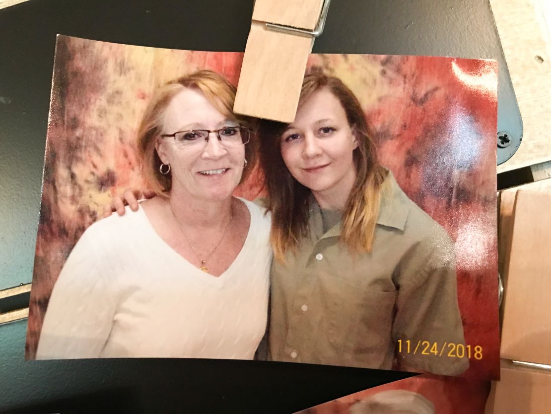 A photograph of Billie Winner-Davis and her daughter Reality during a prison visit, pinned to Winner-Davis' refrigerator.