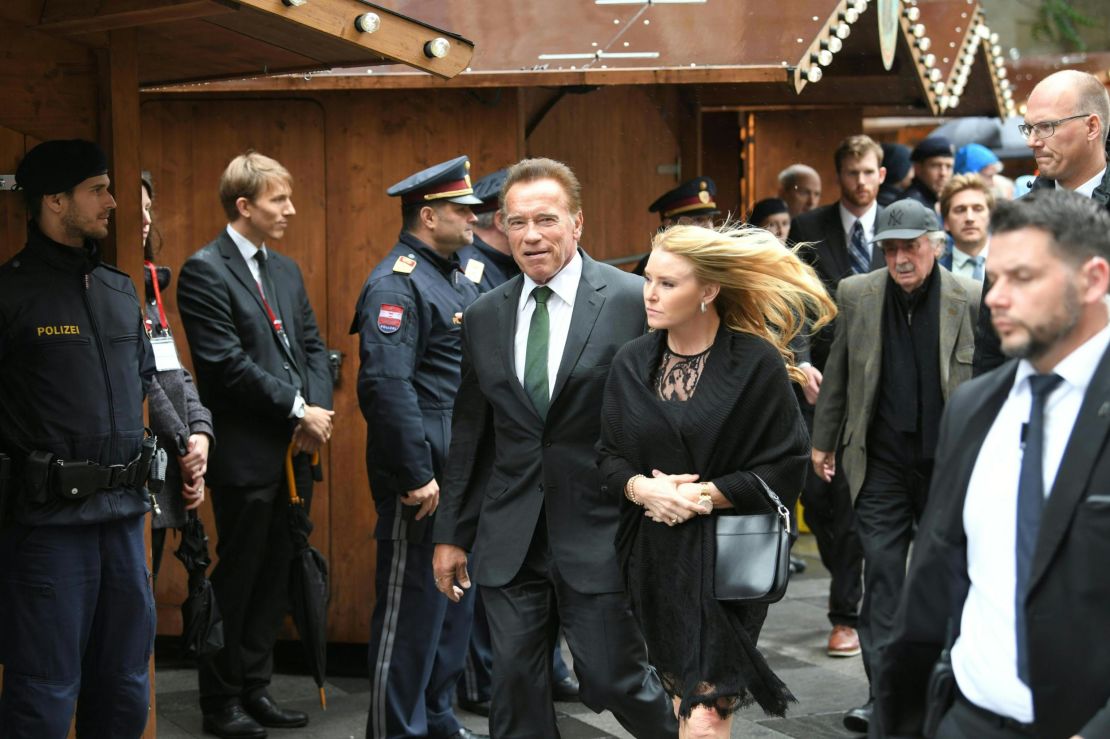Arnold Schwarzenegger and girlfriend Heather Milligan arrive at St. Stephen's in Vienna.