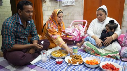 Mateen's family sit down to break their fast with iftar in Old Delhi. 