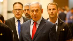 Israeli Prime Minister Benjamin Netanyahu walks in the Knesset, Israel's parliament in Jerusalem.