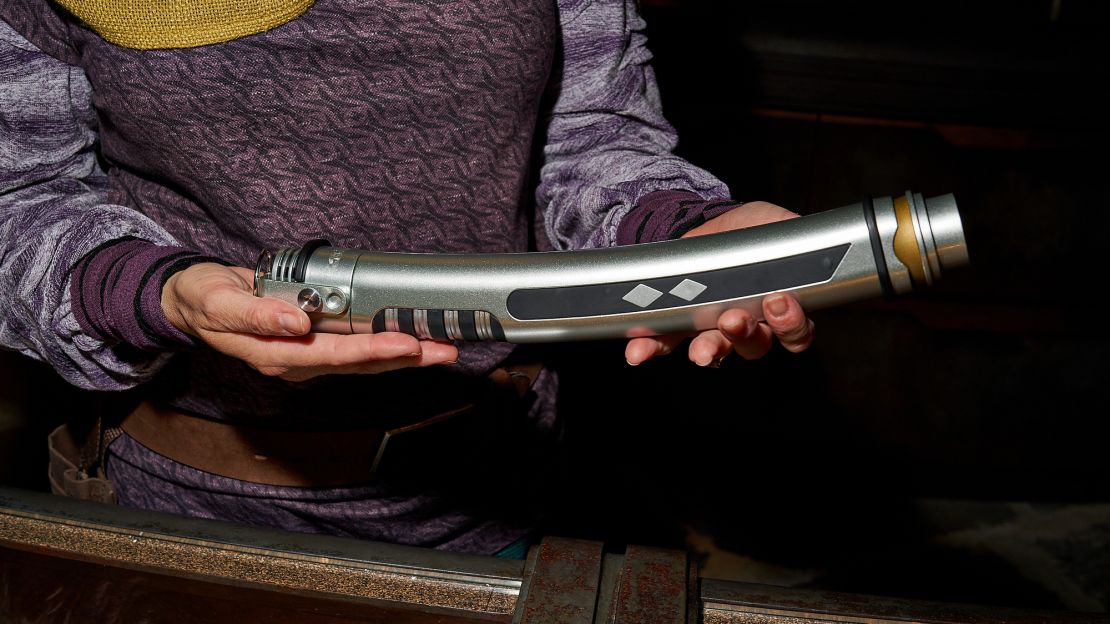 Dok-Ondar sells legacy lightsabers like Ahsoka Tano's double lightsaber from "The Clone Wars."