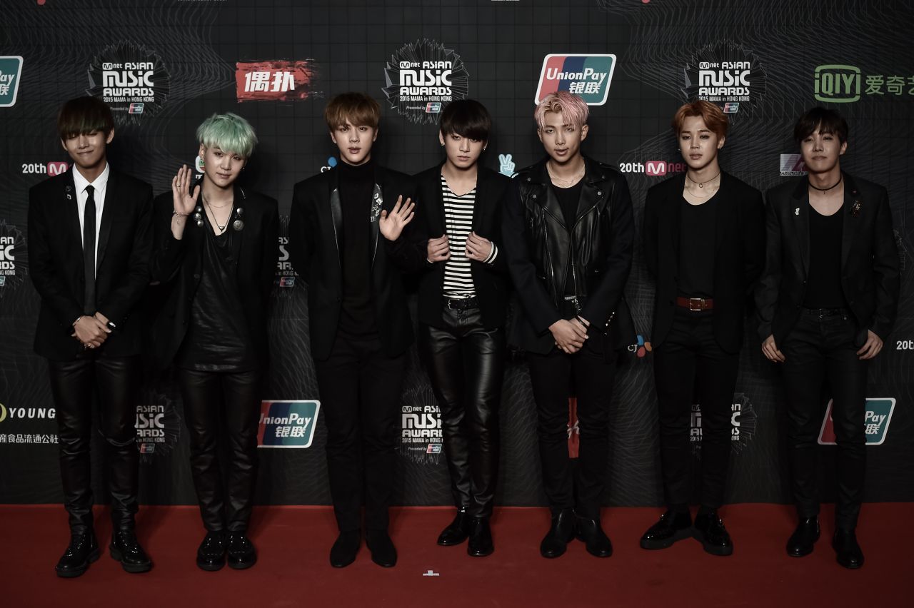 BTS pose on the red carpet of the 2015 Mnet Asian Music Awards in Hong Kong on December 2, 2015. BTS scooped the award for World Performer.  