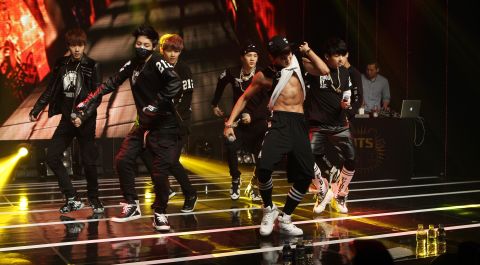 Singer Park Ji-min -- better known as Jimin -- exposes his six-pack as BTS perform during their debut.