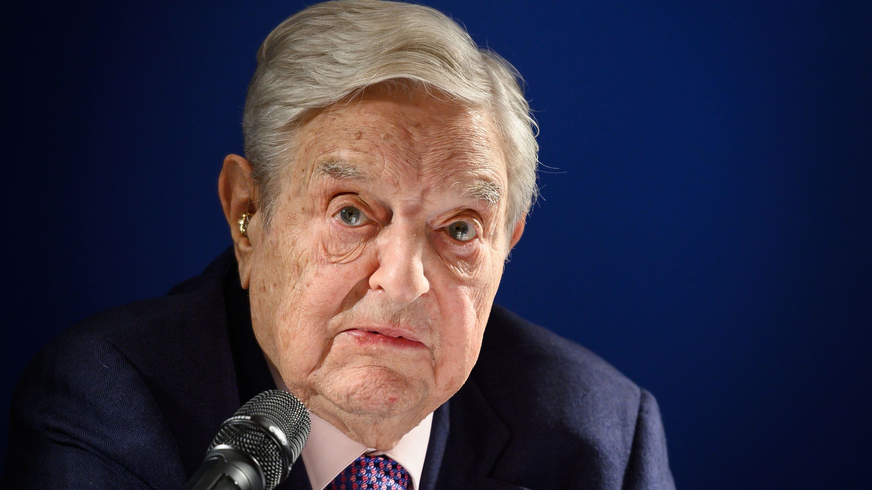 Hungarian-born US investor and philanthropist George Soros delivers a speech on the sideline of the World Economic Forum (WEF) annual meeting, on January 24, 2019 in Davos, eastern Switzerland. - Billionaire investor George Soros said, on January 24, 2019 that Chinese President Xi Jinping was "the most dangerous enemy" of free societies for presiding over a high-tech surveillance regime.