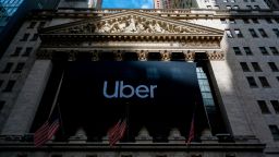 An Uber banner adorns the facade of the New York Stock Exchange ahead of the ride sharing company's IPO (Initial Public Offering), on May 10, 2019, in New York. (Photo by Don Emmert / AFP)        (Photo credit should read DON EMMERT/AFP/Getty Images)