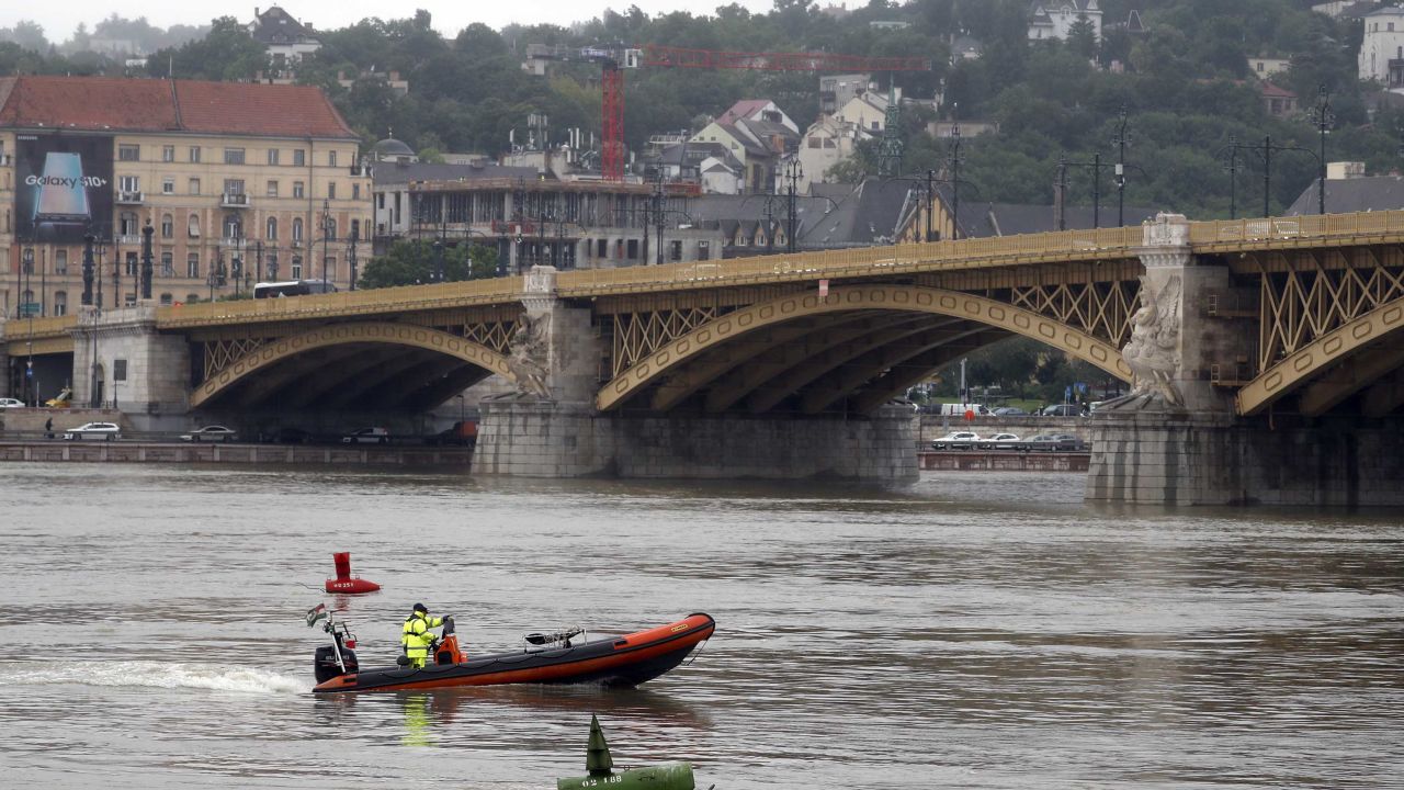 A rescue boat searches for survivors on the River Danube in Budapest, Hungary, Thursday, May 30, 2019. A massive search was underway on the river for missing people after the sightseeing boat with 33 South Korean tourists sank after colliding with another vessel during an evening downpour. (AP Photo/Laszlo Balogh)