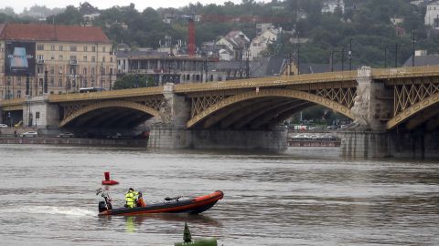 A rescue boat searches for survivors on the River Danube in Budapest, Hungary.