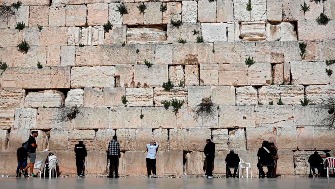 <strong>Western Wall:</strong> Also known as "the wailing wall," visitors will write down prayers on pieces of paper and stick them into the wall.