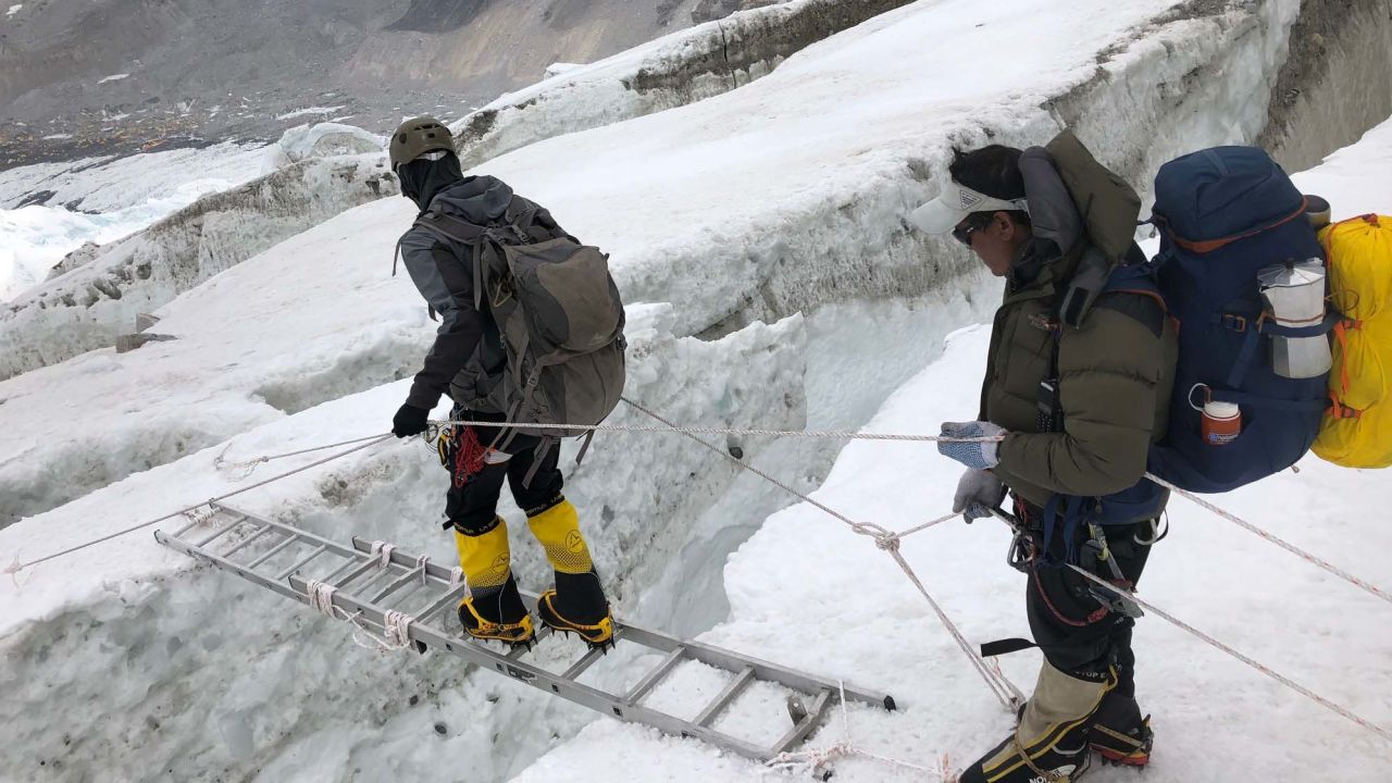 Traversing ravines in the ice. Everest isn't as technical as it used to be, but it still requires significant experience to mitigate the dangers.