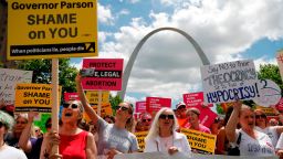 Abortion-rights supporters take part in a protest Thursday, May 30, 2019, in St. Louis. A St. Louis judge heard an hour of arguments Thursday on Planned Parenthood's request for a temporary restraining order that would prohibit the state from allowing the license for Missouri's only abortion clinic to lapse at midnight Friday. (AP Photo/Jeff Roberson)