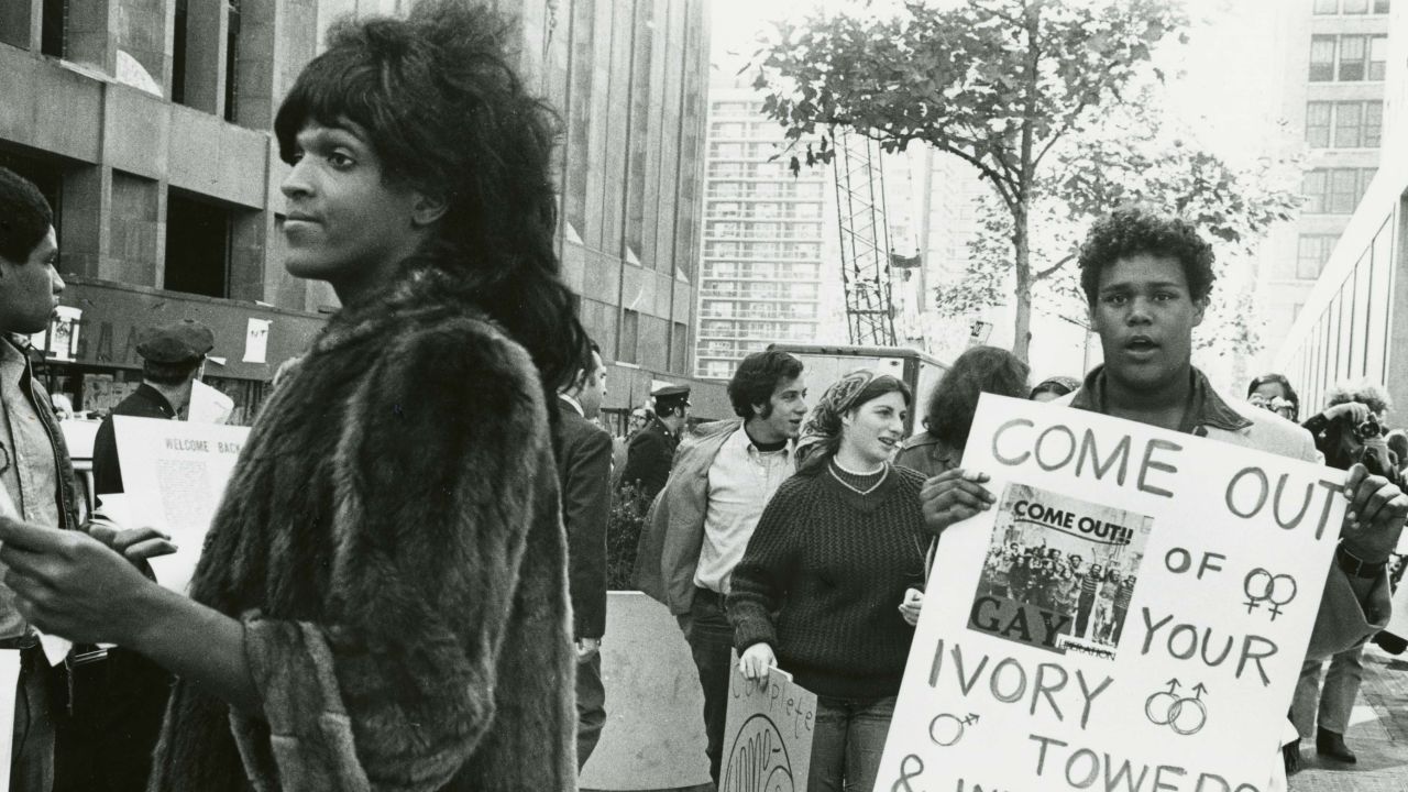 Marsha P. Johnson hands out flyers in support of gay students in 1970 at New York University. 