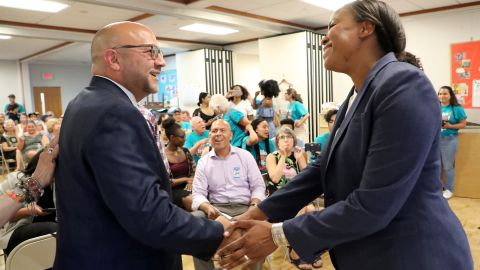 Community advocate Nika Elugardo, right, ousted Rep. Jeffrey Sanchez, left, after taking part in an Answering the Call course.