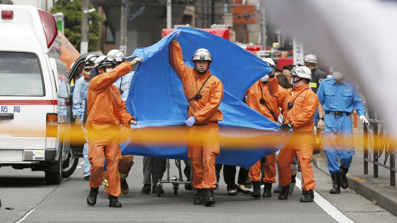 Rescuers work at the scene of a knife attack in Kawasaki, Japan, on Tuesday, May 28. Two people, a 11-year-old girl and a 39-year-old man, were killed in <a href="https://www.cnn.com/2019/05/27/asia/japan-stabbing-intl/index.html" target="_blank">the stabbing spree,</a> and 17 other children were hurt as they waited for a school bus. The suspected attacker, 51, died from a "self-inflicted wound," according to a report from Japanese public broadcaster NHK.