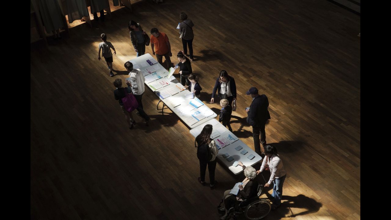 Voters pick up ballots before voting in Lyon, France, on Sunday, May 26. Voters across 28 countries <a href="https://www.cnn.com/2019/05/27/europe/european-elections-takeaways-intl/index.html" target="_blank">were selecting new representatives</a> to sit in the European Parliament.