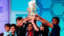 The eight co-champions celebrate after winning the Scripps National Spelling Bee, Friday, May 31, 2019, in Oxon Hill, Md. The spelling bee ended in unprecedented 8-way championship tie after organizers ran out of challenging words.  (AP Photo/Patrick Semansky)