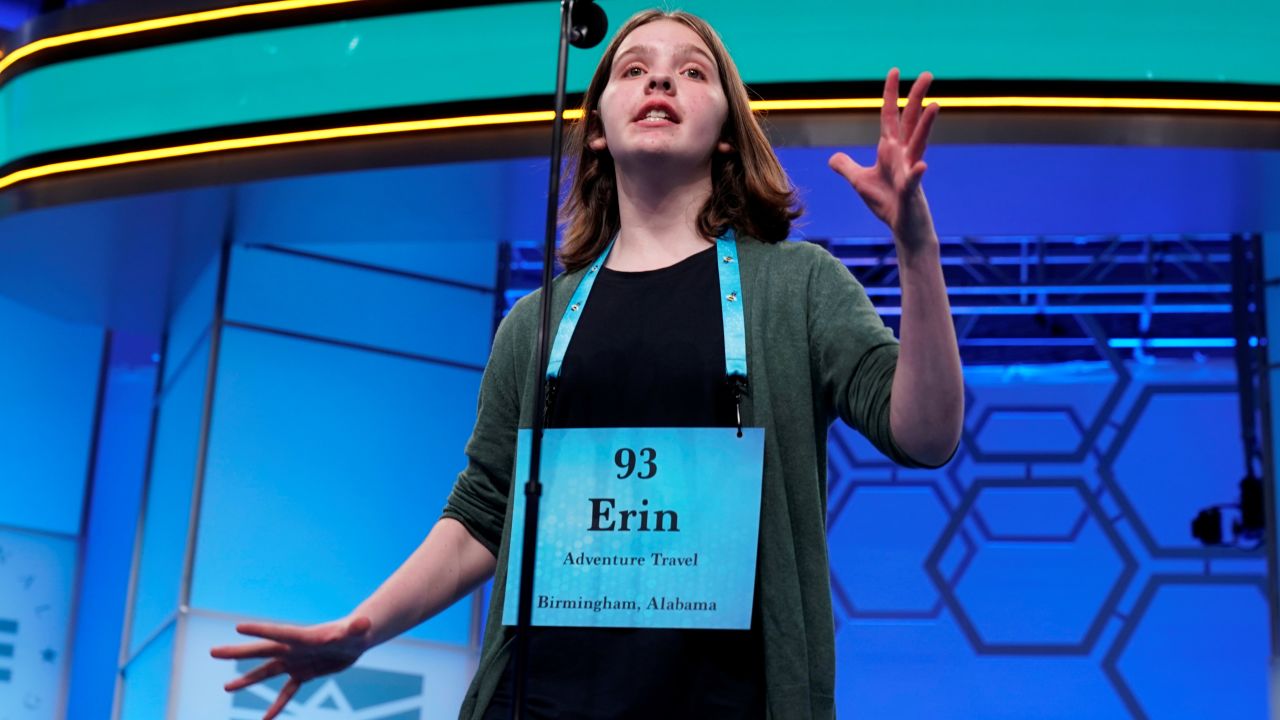 Erin Howard, 14, of Huntsville, Alabama, one of eight co-champions, reacts to her final word in the final round.