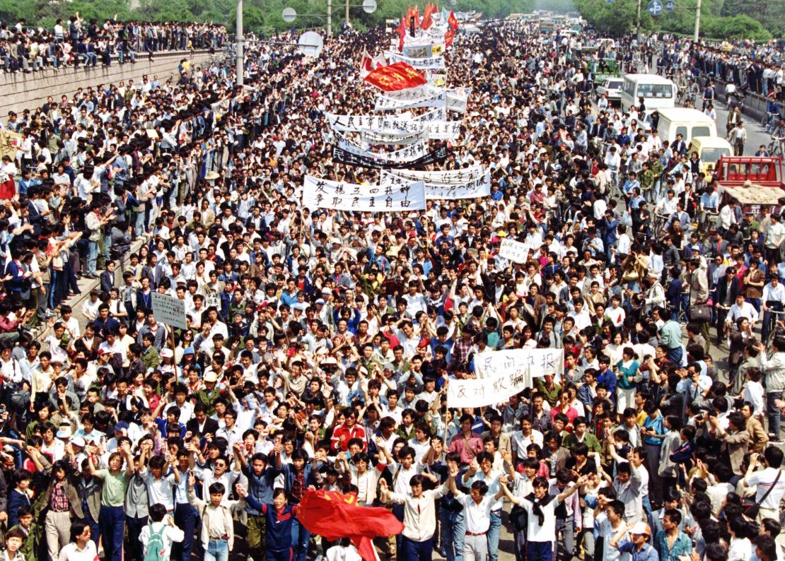 More than seven thousand students from local colleges and universities march to Tiananmen Square, Beijing, May 4, to demonstrate for government reform.