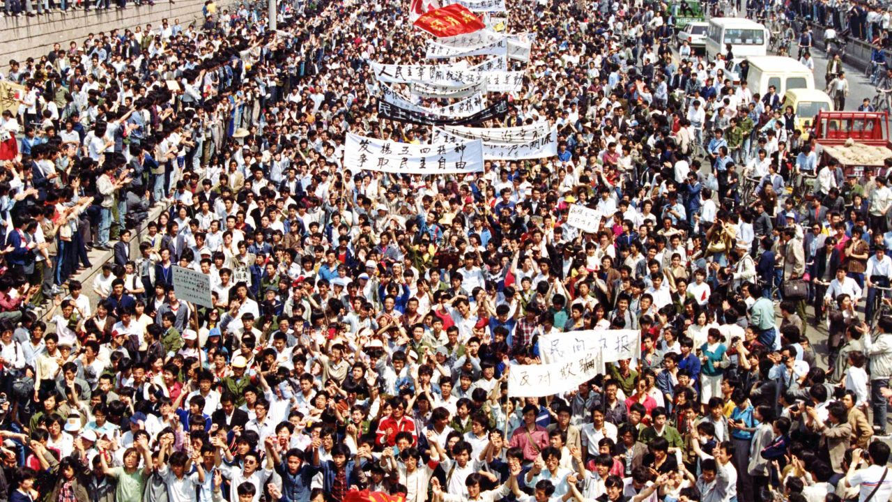 More than seven thousand students from local colleges and universities march to Tiananmen Square, Beijing, May 4, to demonstrate for government reform.