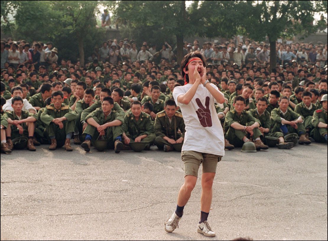 A student asks soldiers to go back home as protesters continue in central Beijing, on  June 3, 1989.  