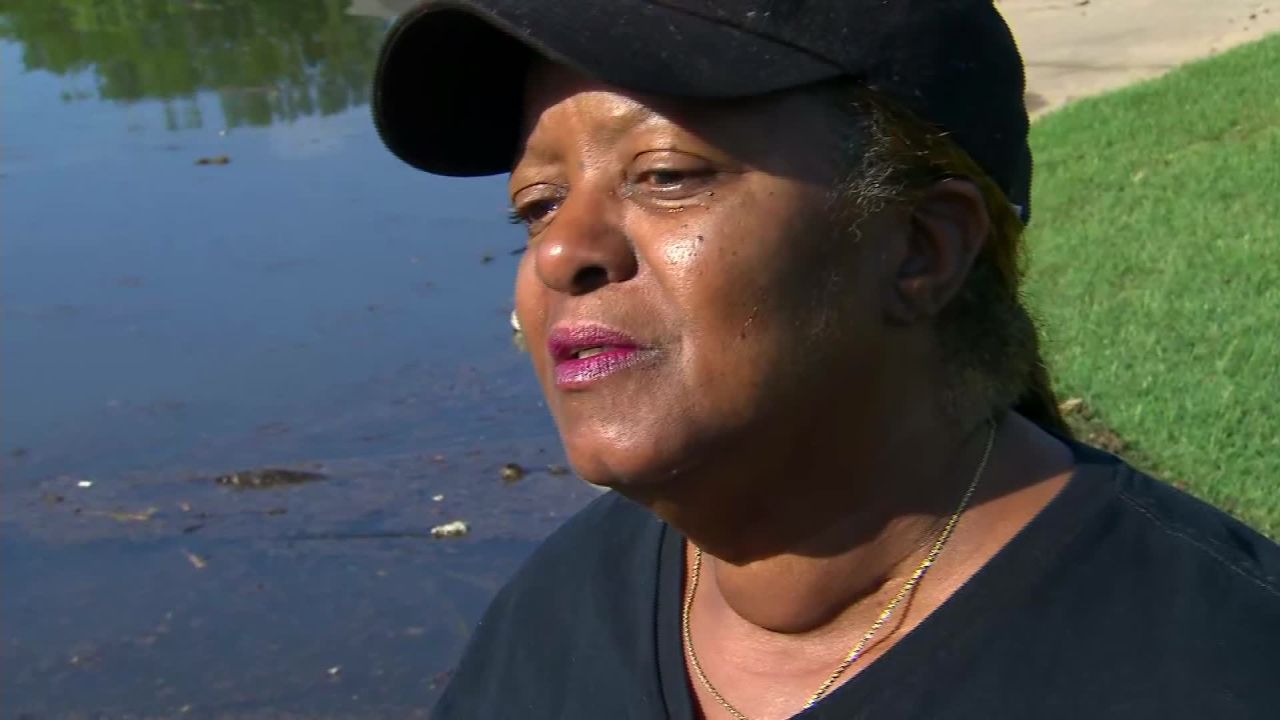 Shelia Clayton says she survived Hurricane Katrina, but the flooding in her new home in Fort Smith, Arkansas, is tough to take.
