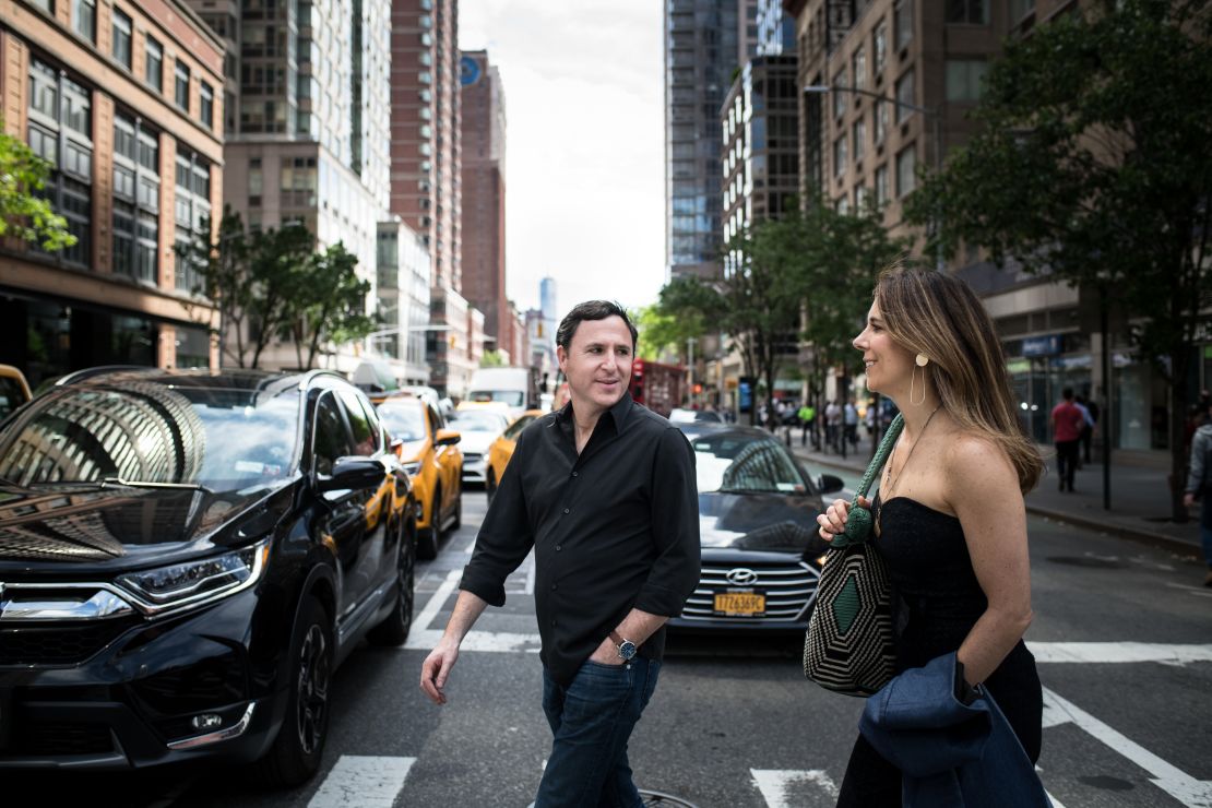 Chait and Cunningham walk through the streets of New York.
