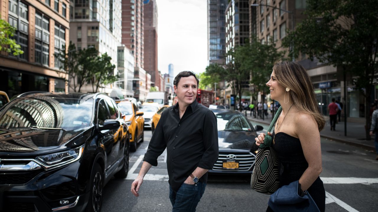 Chait and Cunningham walk through the streets of New York.