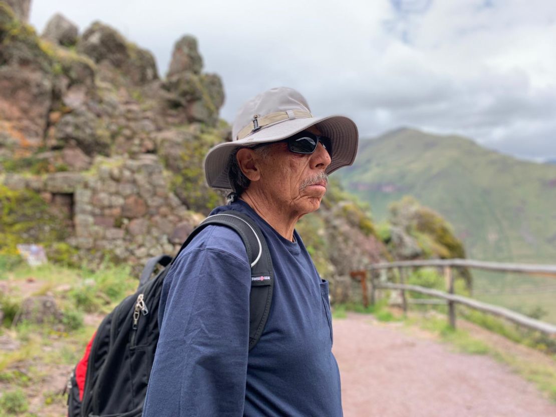 Carlos Valpeoz takes a break from walking around the Pisac Archeological Park. He has been searching for his daughter in Peru since she went missing.