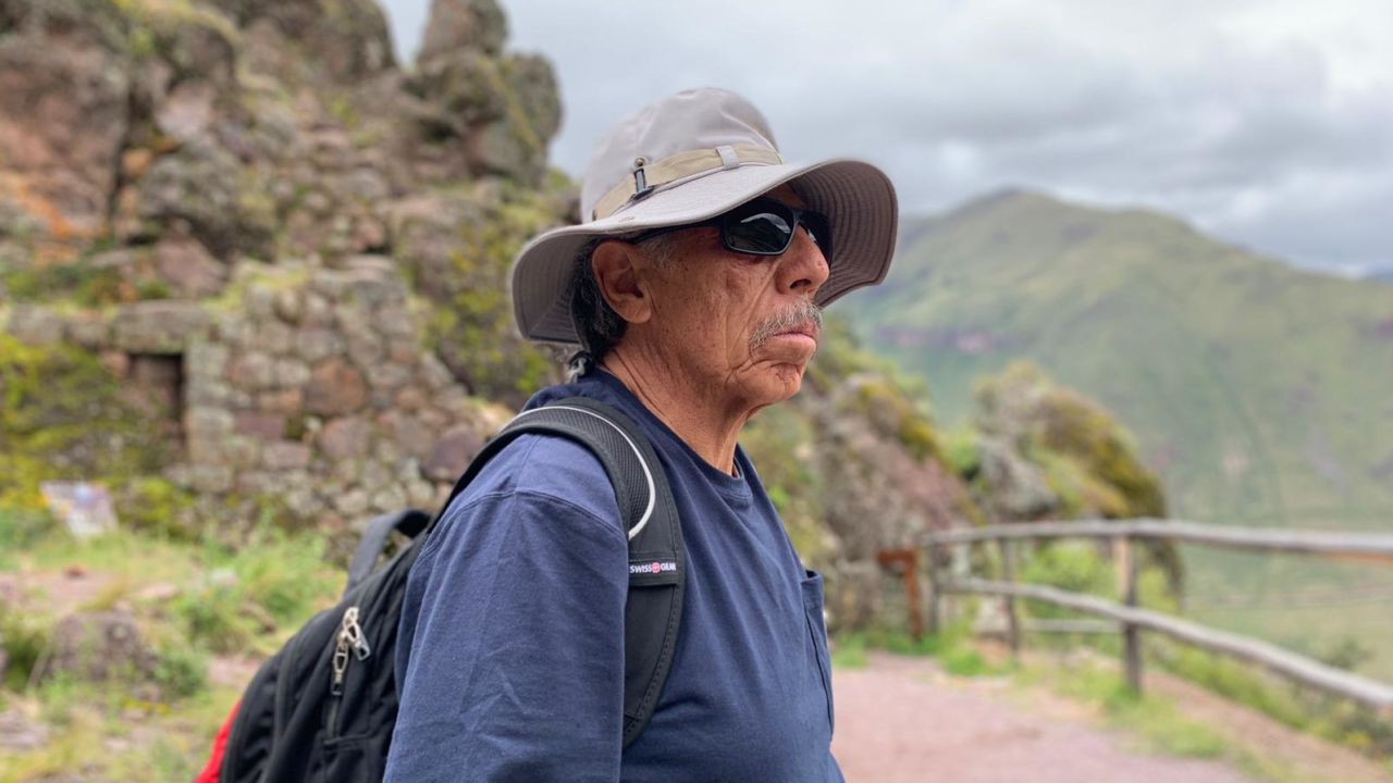 Carlos Valpeoz takes a break from walking around the Pisac Archeological Park. He has been searching for his daughter in Peru since she went missing.