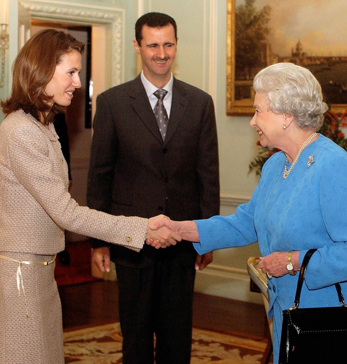 Queen Elizabeth II receives Asma and Bashar al-Assad on December 17, 2002 at Buckingham Palace.