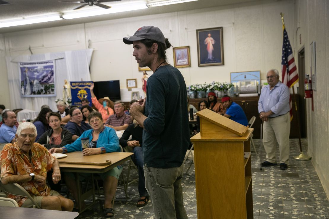 Scott Warren spoke at a community meeting to discuss federal charges against him for providing food and shelter to undocumented immigrants on May 10 in Ajo, Arizona.