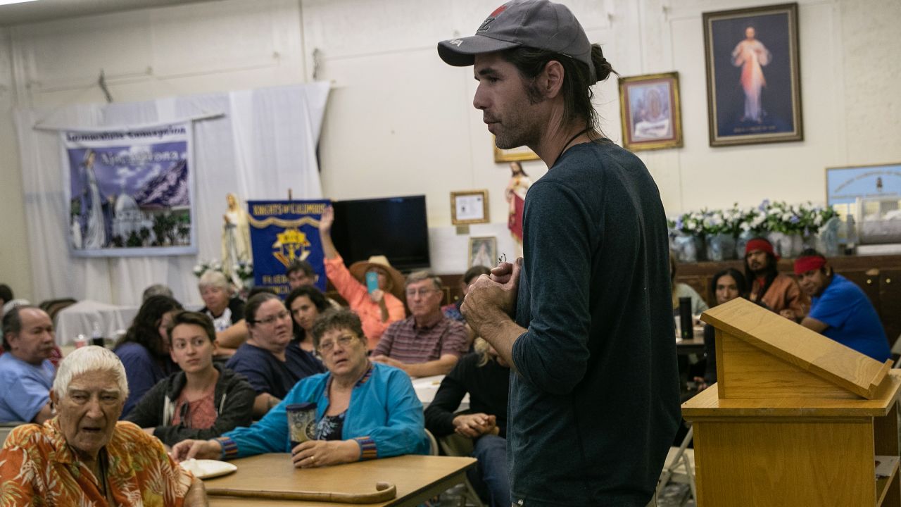 Scott Warren spoke at a community meeting to discuss federal charges against him for providing food and shelter to undocumented immigrants on May 10 in Ajo, Arizona.