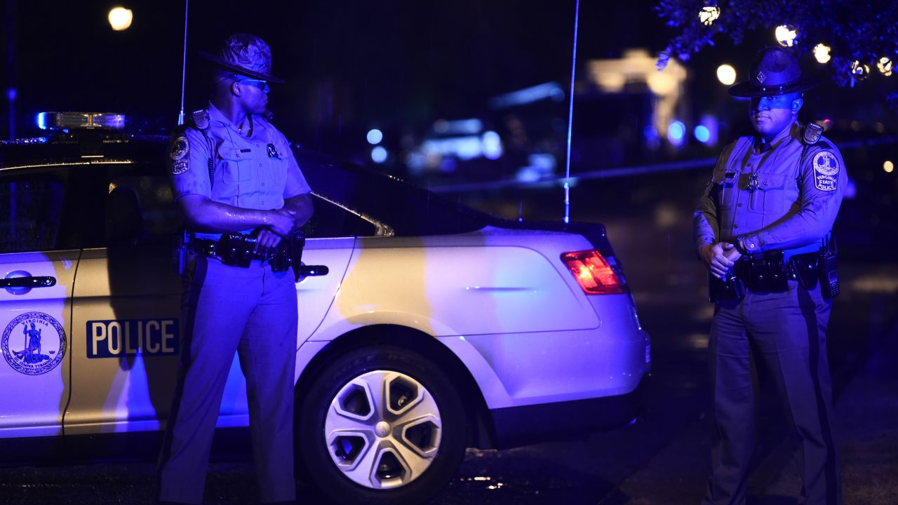 Police officers block access to the Virginia Beach municipal center, the site of a mass shooting, in Virginia Beach, Virginia in the late hours of May 31, 2019.