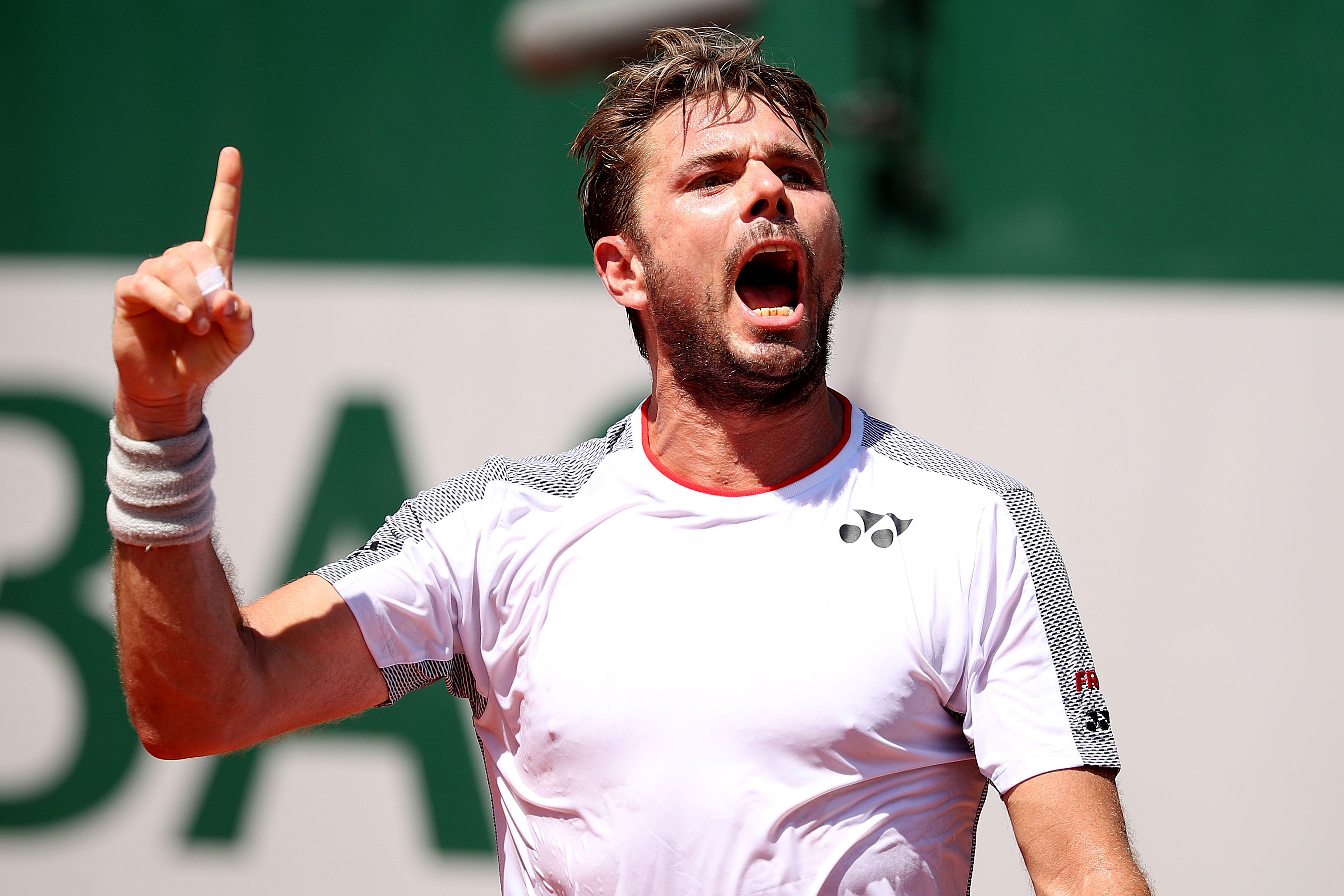 Stan Wawrinka, the 2015 champion, collected his 500th career win when he completed a 7-6 7-6 7-6 win over Grigor Dimitrov. The match had been suspended due to darkness Friday after two sets.