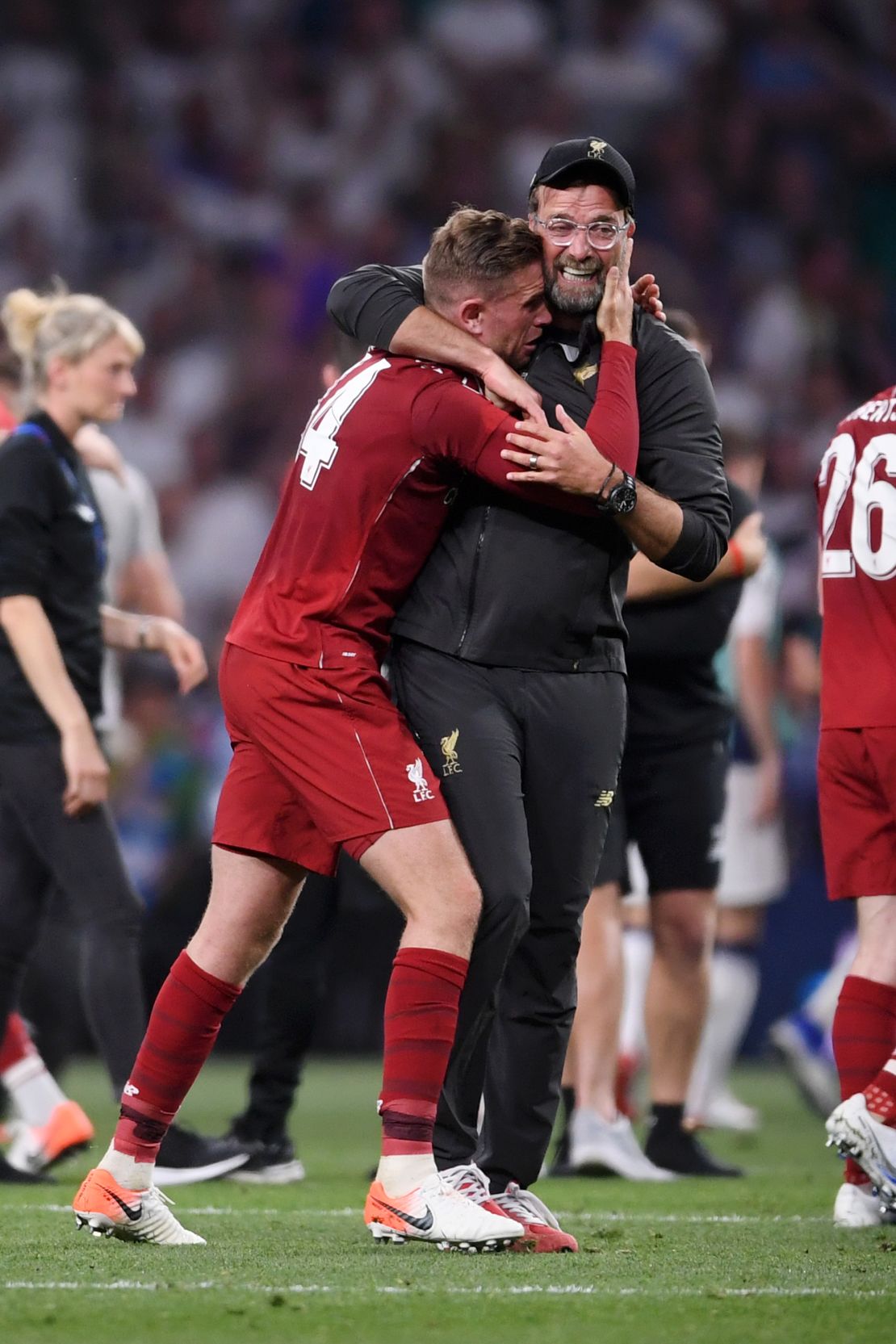 Liverpool captain Jordan Henderson of Liverpool celebrates with manager Jurgen Klopp at the final whistle.