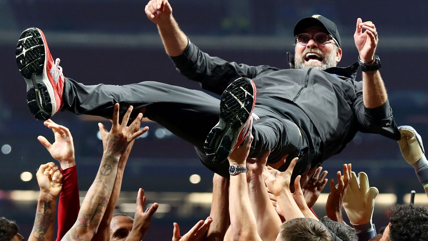 Liverpool manager Jurgen Klopp is thrown in the air as he celebrates with his players and staff after winning the Champions League final against Tottenham Hotspur in Madrid on Saturday. 