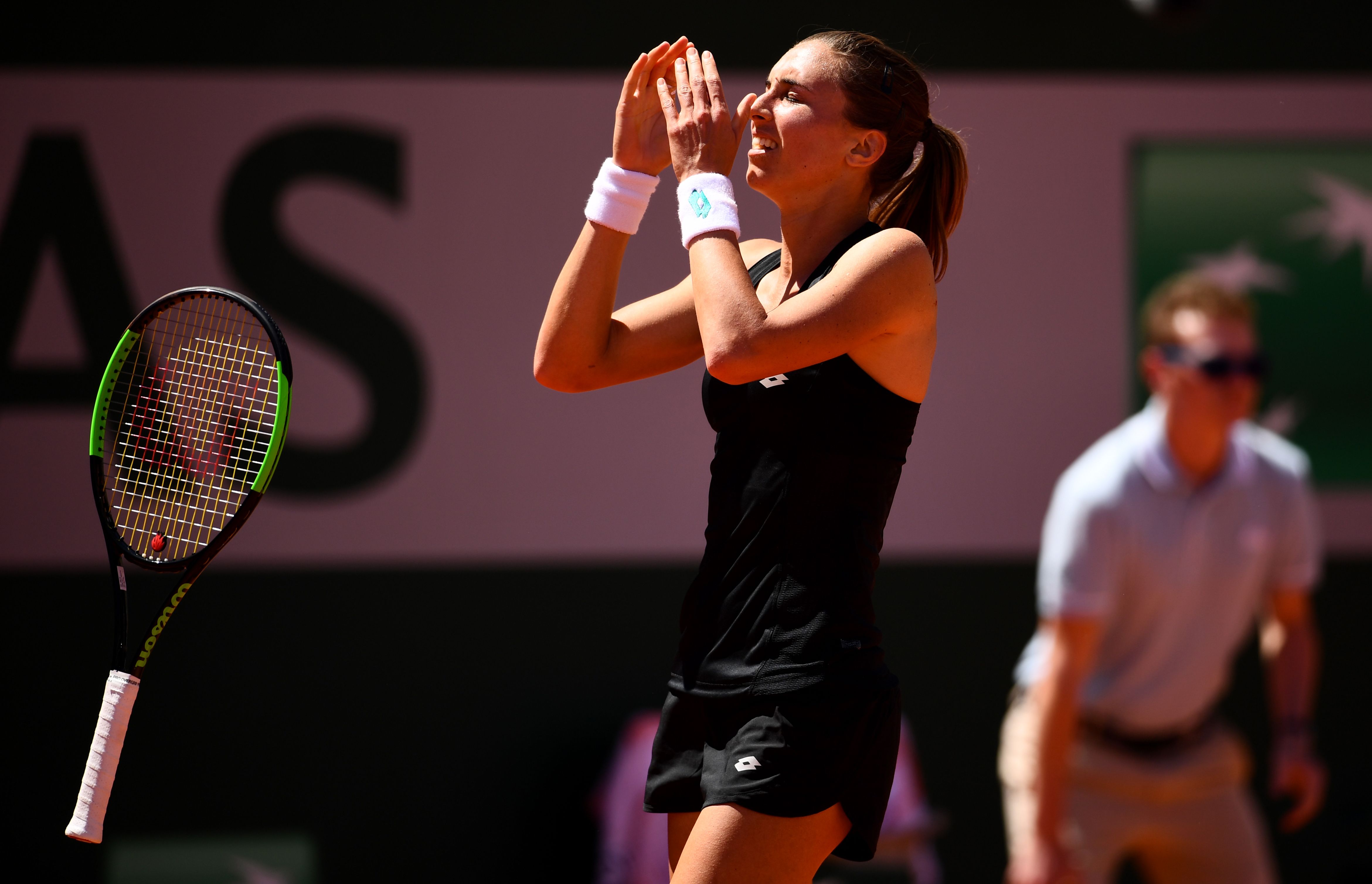 After going 0-4 in her previous grand slam fourth rounds, Petra Martic broke through by beating Kaia Kanepi in three sets.
