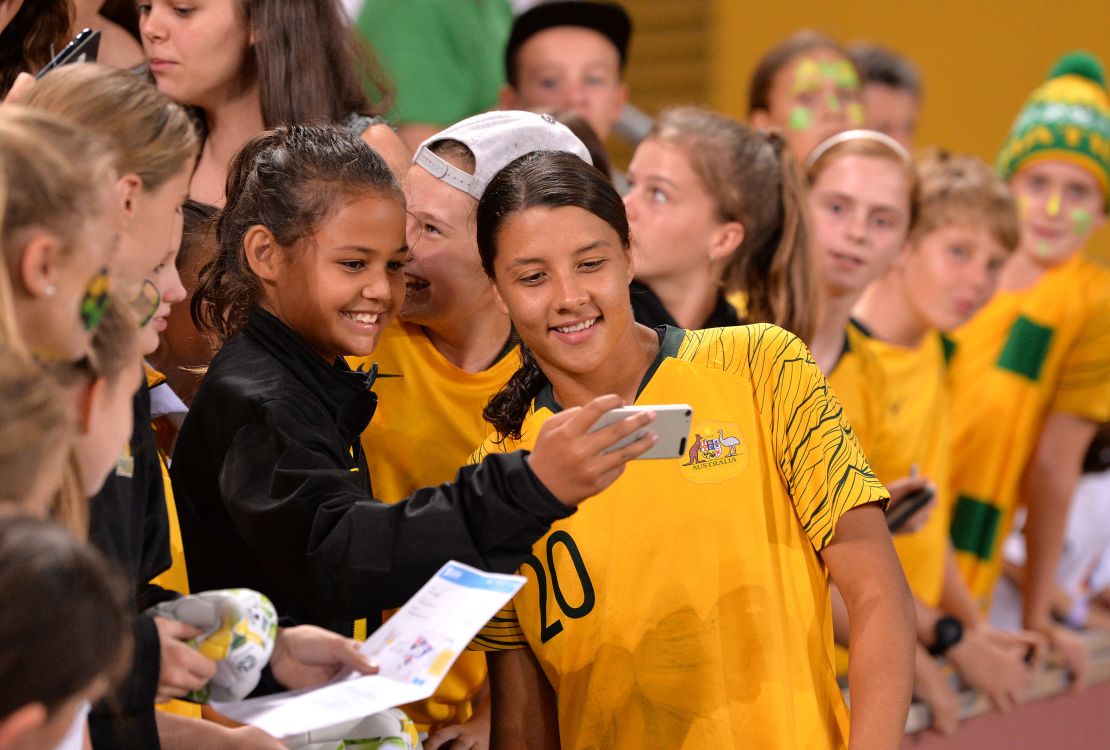 Kerr takes a selfie with a young fan  after the 2019 Cup of Nations match between Australia and South Korea in March.